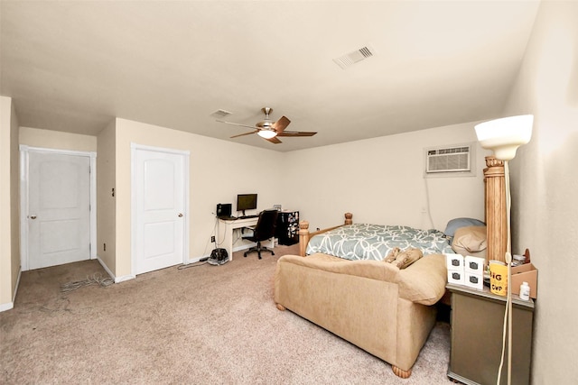 13230 Ferry Hill Ln, Houston, TX 77015 - carpeted bedroom featuring a desk, a wall unit AC, baseboards, and a ceiling fan