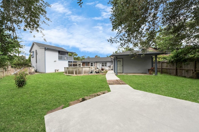 13230 Ferry Hill Ln, Houston, TX 77015 - back of house featuring a hot tub and a patio area