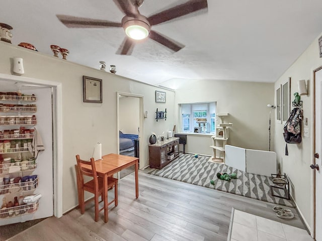 13230 Ferry Hill Ln, Houston, TX 77015 - dining area featuring ceiling fan, vaulted ceiling, and wood finished floors