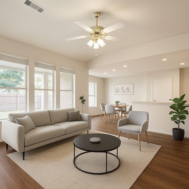 living room featuring dark wood finished floors, recessed lighting, ceiling fan, and baseboards