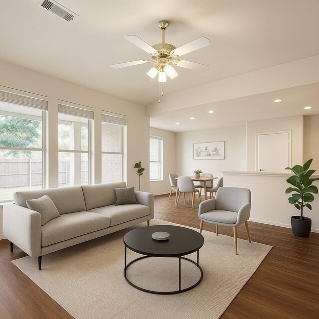 8414 Manassas Ln, Houston, TX 77083 - living room featuring dark wood finished floors, recessed lighting, ceiling fan, and baseboards