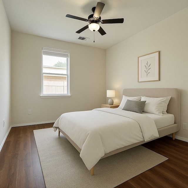 bedroom featuring dark wood-style flooring, baseboards, and a ceiling fan