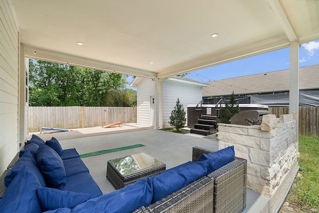 view of patio with outdoor lounge area and a fenced backyard