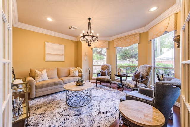 living room featuring crown molding, visible vents, an inviting chandelier, recessed lighting, and wood finished floors
