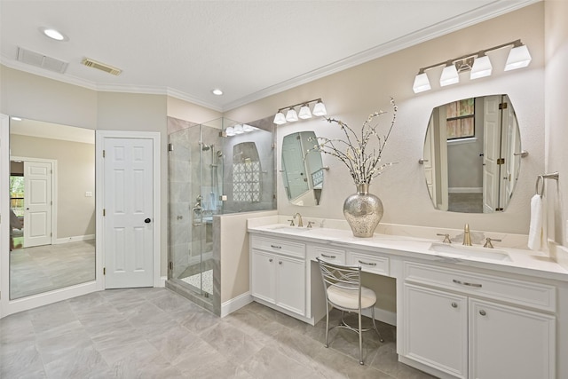 bathroom with a shower stall, visible vents, a sink, and crown molding