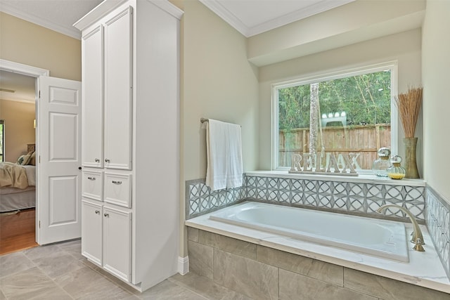 full bathroom with ornamental molding, a bath, and ensuite bath