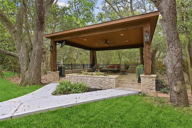 view of community featuring a yard and a gazebo