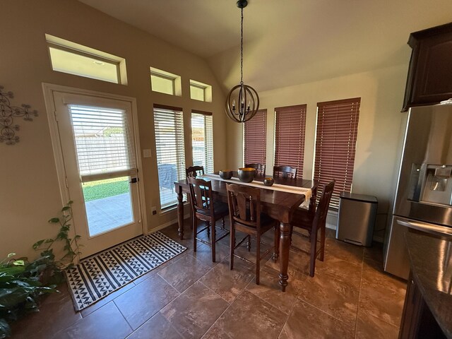 29046 Davenport Dr, Katy, TX 77494 - dining area with an inviting chandelier and lofted ceiling