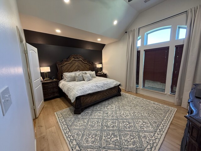 29046 Davenport Dr, Katy, TX 77494 - bedroom with vaulted ceiling, recessed lighting, and light wood-style flooring
