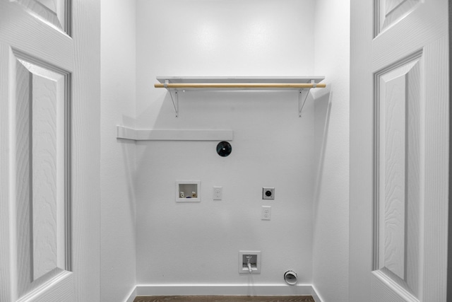 clothes washing area with hookup for a gas dryer, electric dryer hookup, baseboards, and hookup for a washing machine