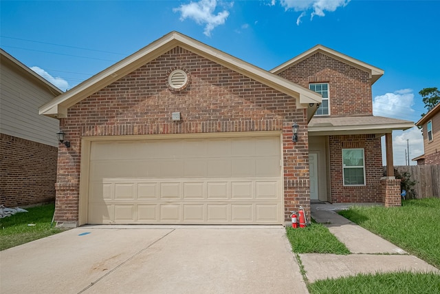 7727 N Friesian Meadow Ln NW, Humble, TX 77338 - view of front of home with brick siding, driveway, and a garage