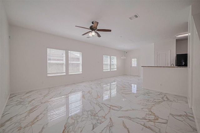 7727 N Friesian Meadow Ln NW, Humble, TX 77338 - unfurnished room with ceiling fan and light marble finish flooring