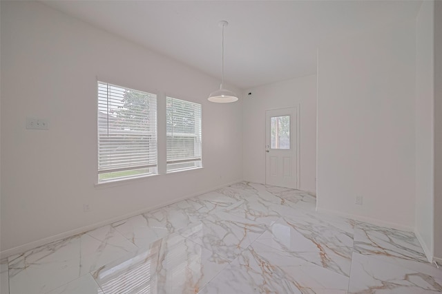 7727 N Friesian Meadow Ln NW, Humble, TX 77338 - empty room featuring light marble finish floors and baseboards