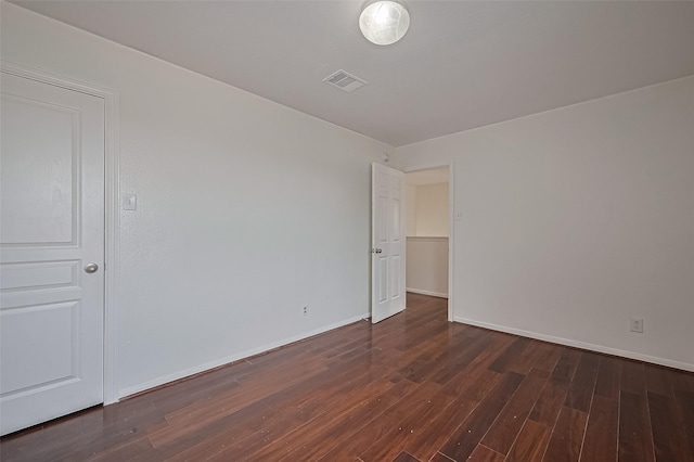 7727 N Friesian Meadow Ln NW, Humble, TX 77338 - unfurnished room with wood finished floors and baseboards