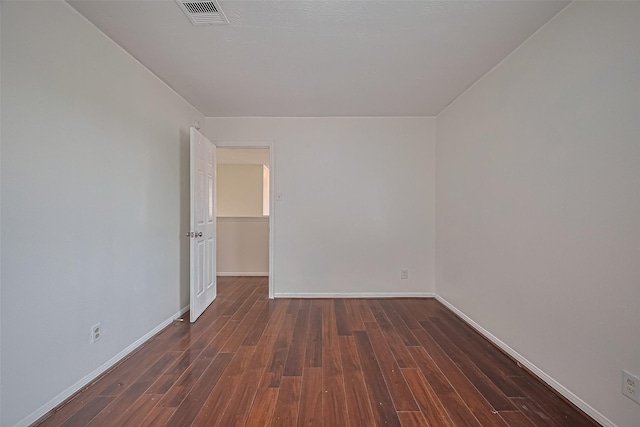 7727 N Friesian Meadow Ln NW, Humble, TX 77338 - spare room with wood finished floors and baseboards