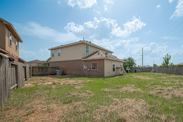 7727 N Friesian Meadow Ln NW, Humble, TX 77338 - back of property featuring brick siding and a fenced backyard