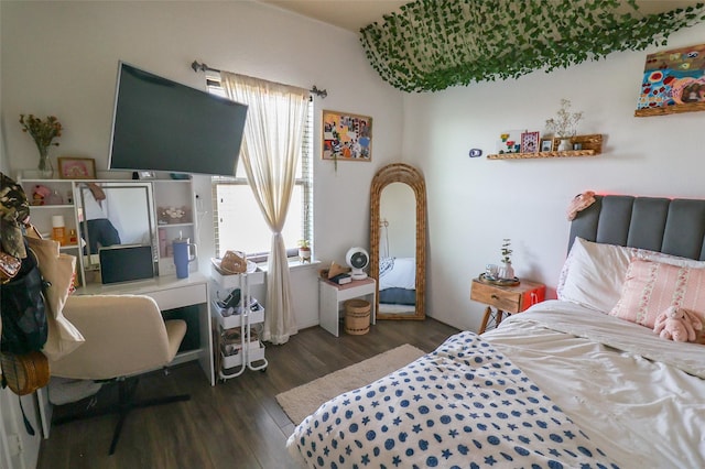 bedroom featuring wood finished floors