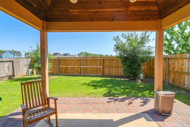 view of patio with a fenced backyard and a gazebo