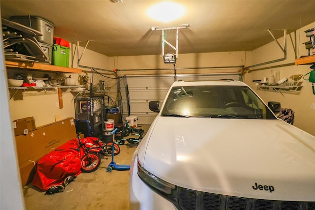 garage featuring a garage door opener