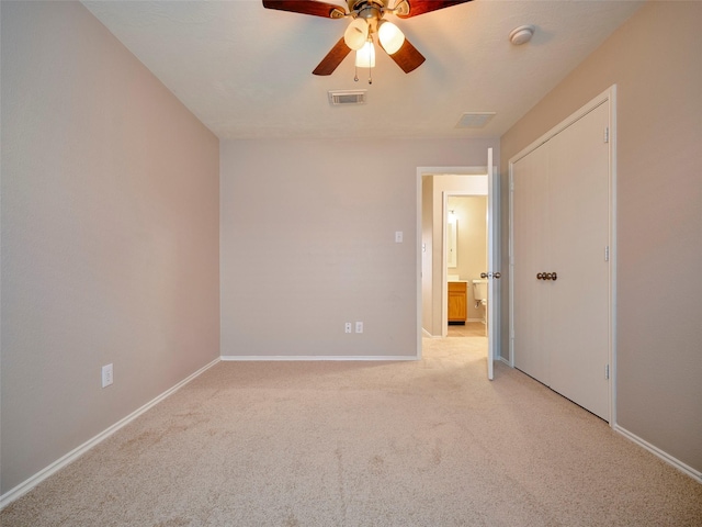 1122 Cotton Gum Ln, Rosenberg, TX 77471 - unfurnished room featuring light carpet, visible vents, baseboards, and a ceiling fan
