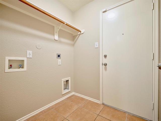 1122 Cotton Gum Ln, Rosenberg, TX 77471 - washroom with electric dryer hookup, baseboards, light tile patterned floors, laundry area, and hookup for a washing machine