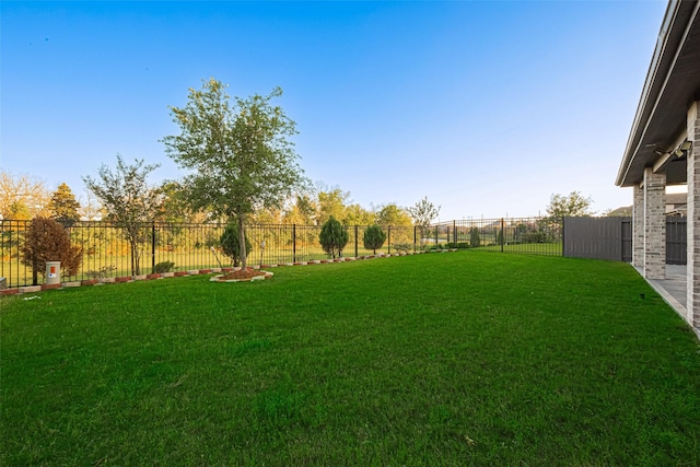 view of yard featuring a fenced backyard