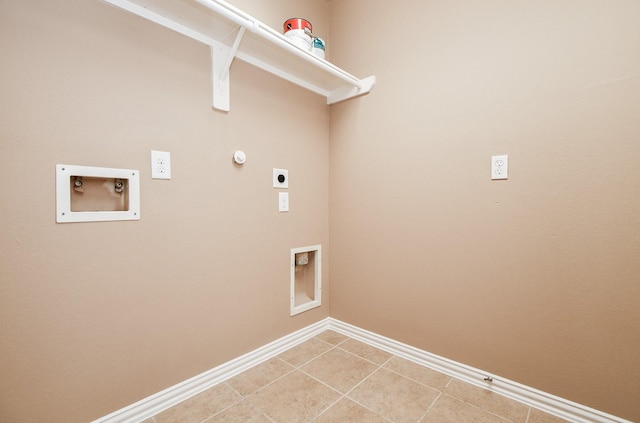 washroom featuring hookup for a washing machine, hookup for an electric dryer, light tile patterned flooring, baseboards, and laundry area
