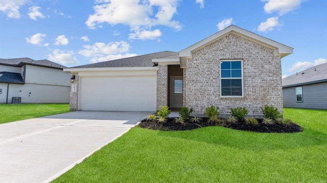 single story home with an attached garage, driveway, central AC unit, and a front lawn
