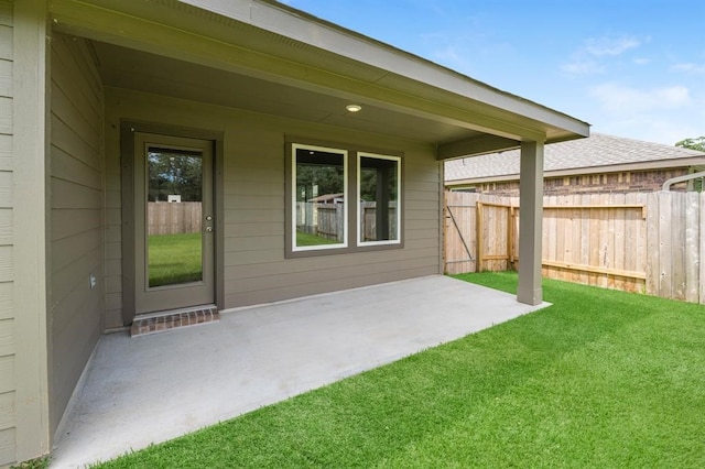 view of yard with a patio area and fence