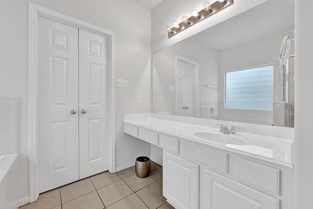 bathroom featuring vanity and tile patterned flooring