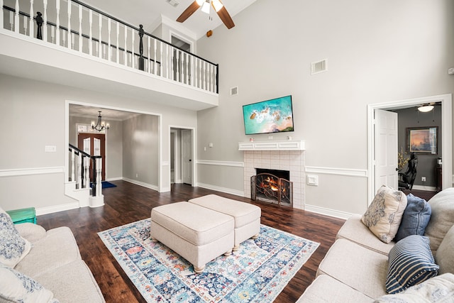 14102 Haynes Dr, Houston, TX 77069 - living area featuring high vaulted ceiling, stairs, visible vents, and ceiling fan with notable chandelier