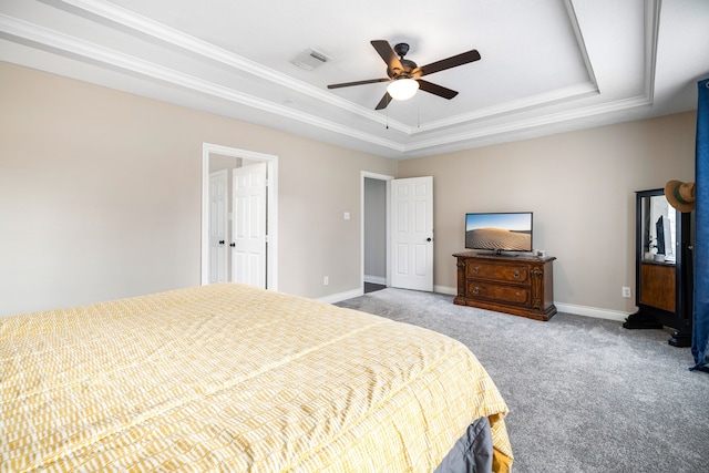 14102 Haynes Dr, Houston, TX 77069 - bedroom featuring carpet flooring, visible vents, a tray ceiling, and ornamental molding