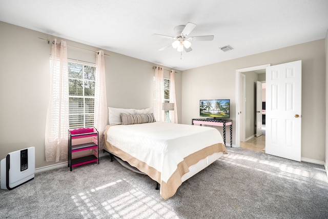 14102 Haynes Dr, Houston, TX 77069 - bedroom featuring carpet flooring, visible vents, multiple windows, and baseboards