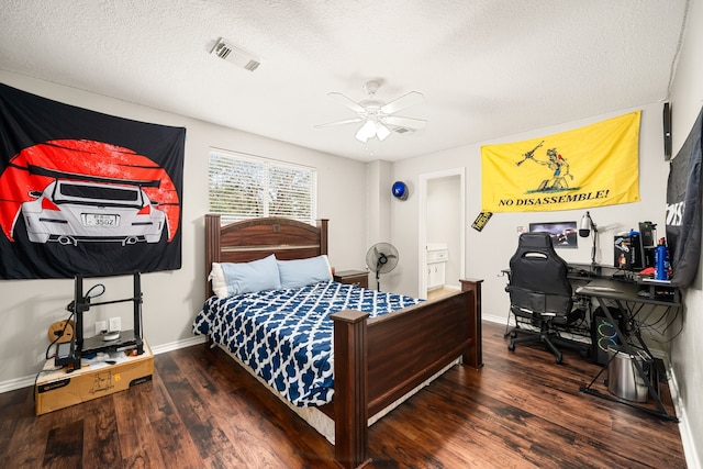 14102 Haynes Dr, Houston, TX 77069 - bedroom with visible vents, baseboards, a textured ceiling, and wood finished floors
