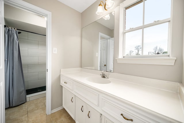14102 Haynes Dr, Houston, TX 77069 - full bath featuring tiled shower, vanity, baseboards, and tile patterned flooring