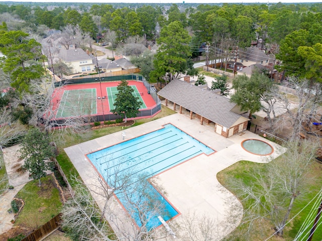 14102 Haynes Dr, Houston, TX 77069 - community pool featuring a patio area and fence