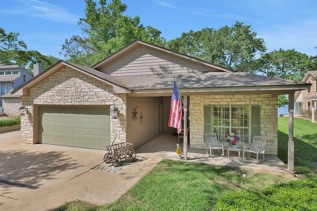 view of front facade with an attached garage, a shingled roof, driveway, and stone siding