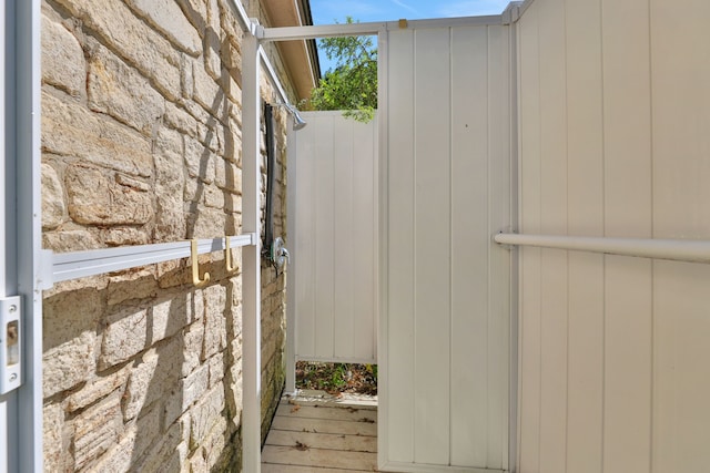 view of side of home featuring stone siding