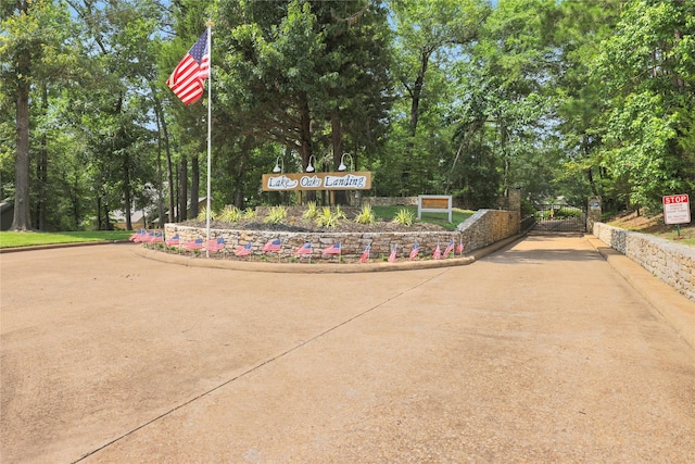 surrounding community featuring a gate