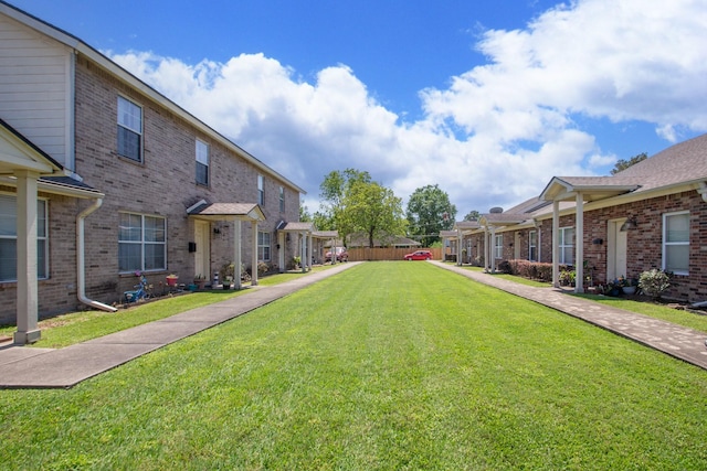 view of yard featuring a residential view