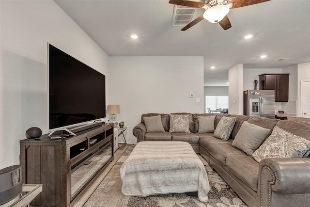21723 Sarasota Spice St, Tomball, TX 77377 - living area featuring visible vents, light wood-style flooring, recessed lighting, and a ceiling fan
