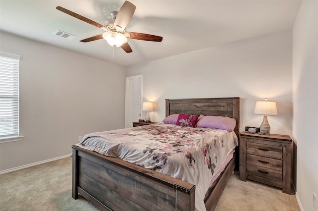 21723 Sarasota Spice St, Tomball, TX 77377 - bedroom featuring visible vents, baseboards, multiple windows, and light colored carpet