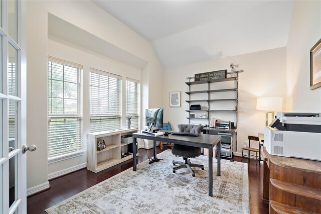 office featuring baseboards, vaulted ceiling, and dark wood-style floors