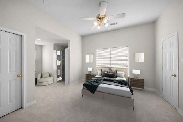 bedroom featuring baseboards, visible vents, carpet, and ceiling fan