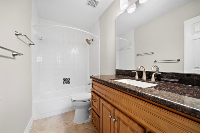 bathroom with toilet, vanity, bathtub / shower combination, and visible vents