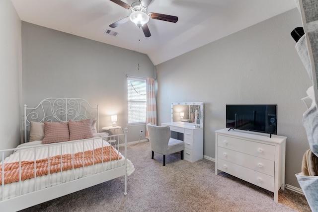 bedroom featuring visible vents, baseboards, a ceiling fan, light carpet, and lofted ceiling