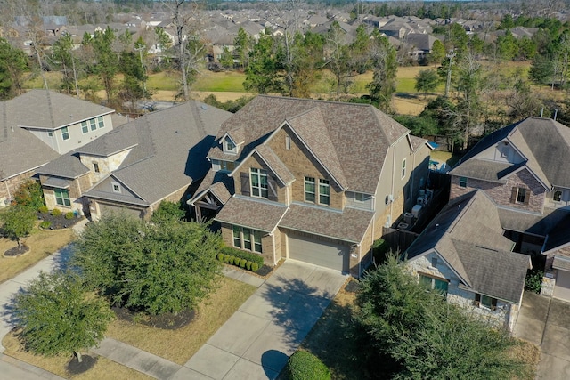 birds eye view of property with a residential view