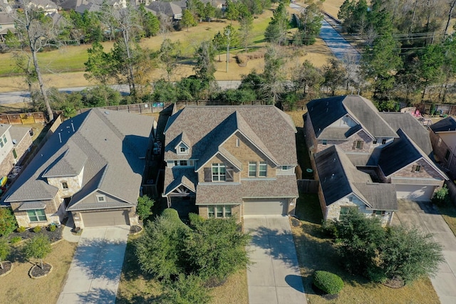birds eye view of property with a residential view