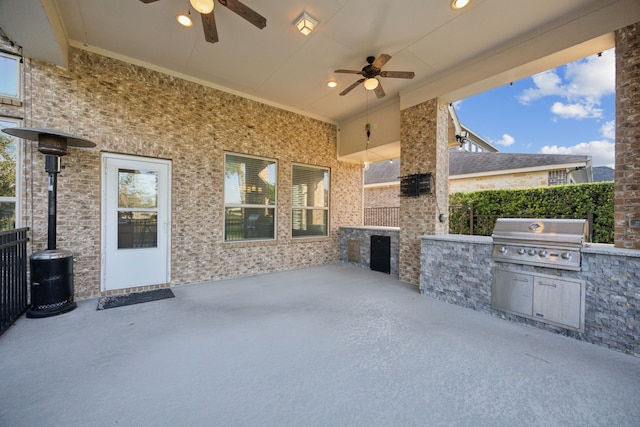 8227 Caroline Ridge Dr, Humble, TX 77396 - view of patio / terrace featuring a ceiling fan, exterior kitchen, and area for grilling