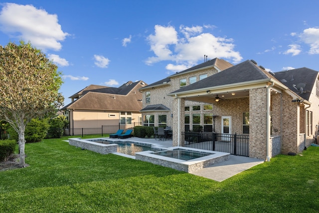 8227 Caroline Ridge Dr, Humble, TX 77396 - rear view of property featuring a patio, a ceiling fan, brick siding, and a pool with connected hot tub